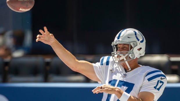 Indianapolis Colts quarterback Philip Rivers warms up before Saturday's scrimmage at Lucas Oil Stadium.